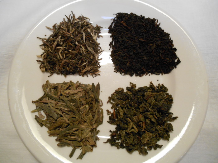 The four types of tea:  (starting from upper right and moving clockwise) black, oolong, green, and white.